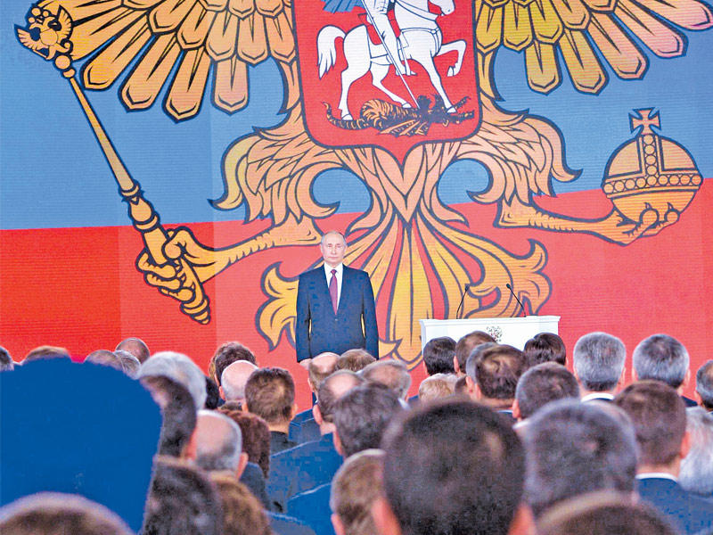  بوتين خلال خطابه للأمة في موسكو أمس          (رويترز) 