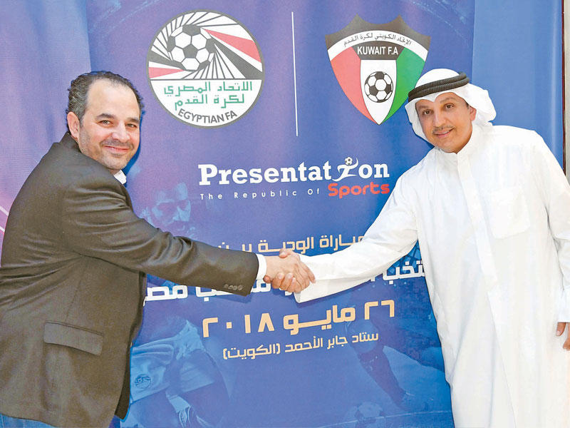 الربيّع مصافحاً كامل بعد الاتفاق