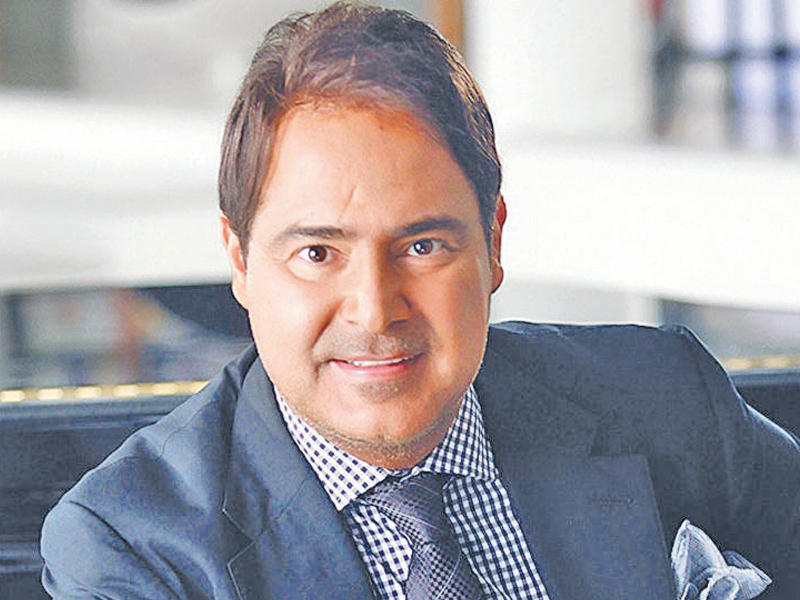 ​عاصي الحلاني