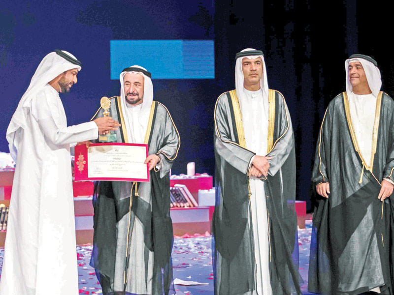 القاسمي مكرماً محمد العامريn