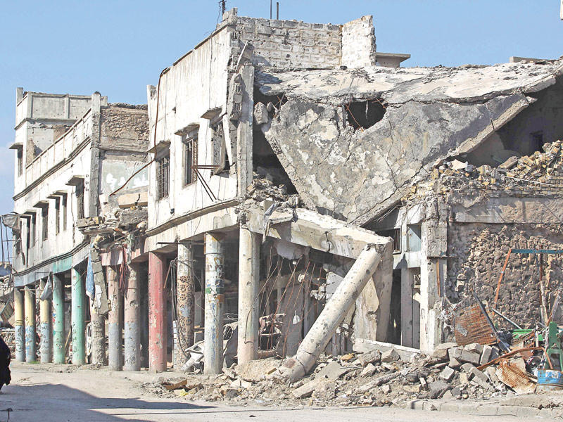 مبانٍ قصفت خلال الحرب على داعش في الموصل القديمة (أ ف ب)