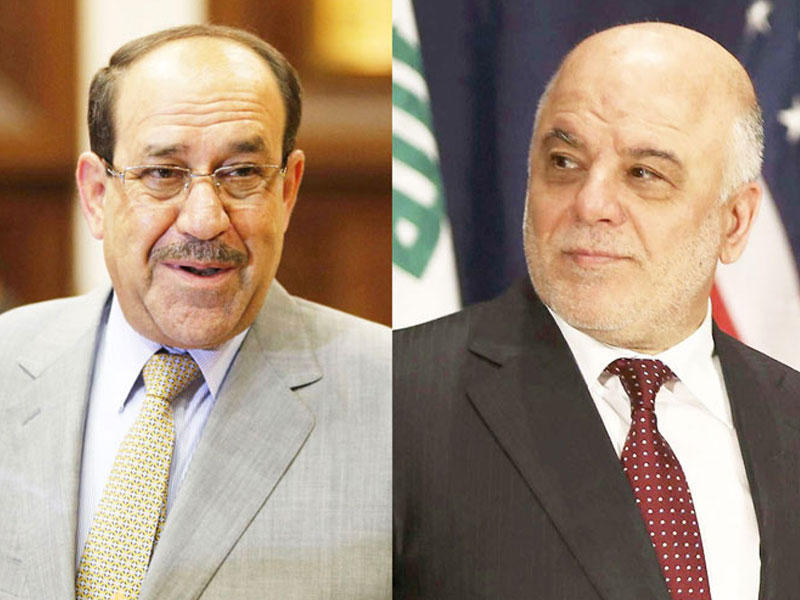 رئيس الحكومة الحالية حيدر العبادي وسلفه نوري المالكي