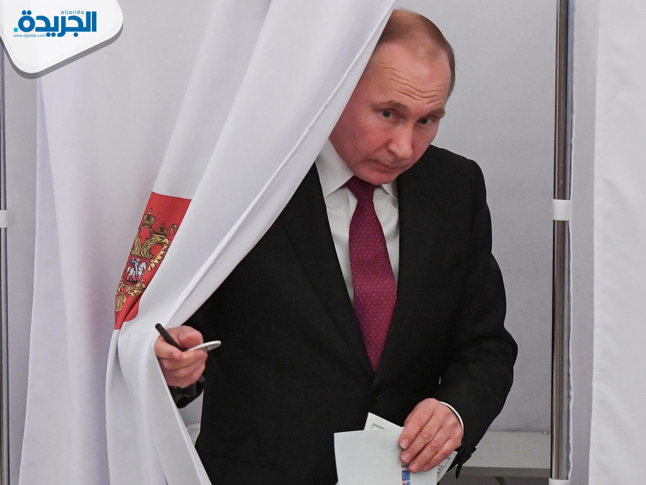 بوتين يدلي بصوته في أحد مراكز الاقتراع