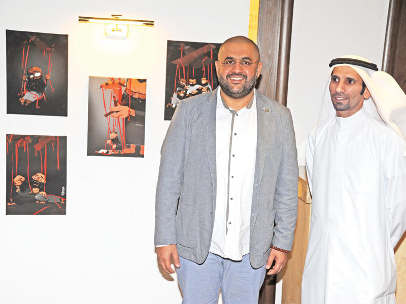 عبدالله الفلاح وبن سيف في المعرض