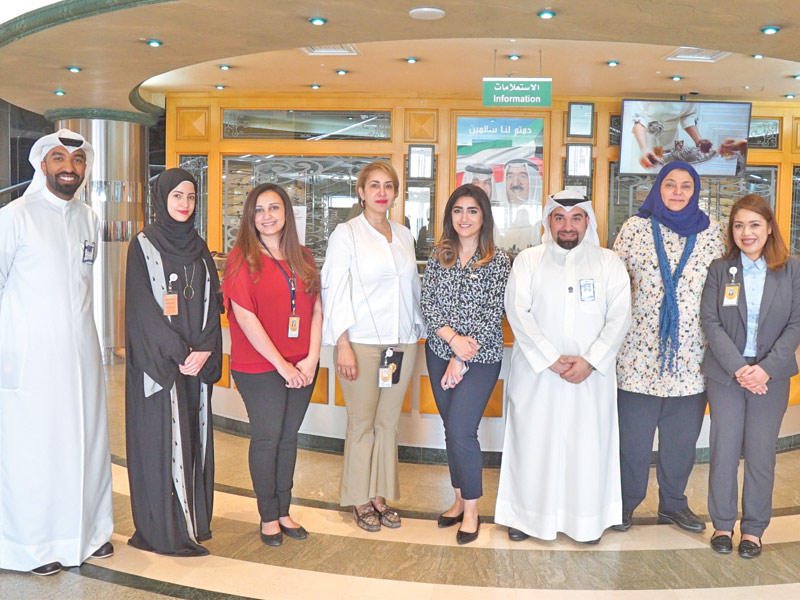 فريق «الوطني» خلال الزيارة