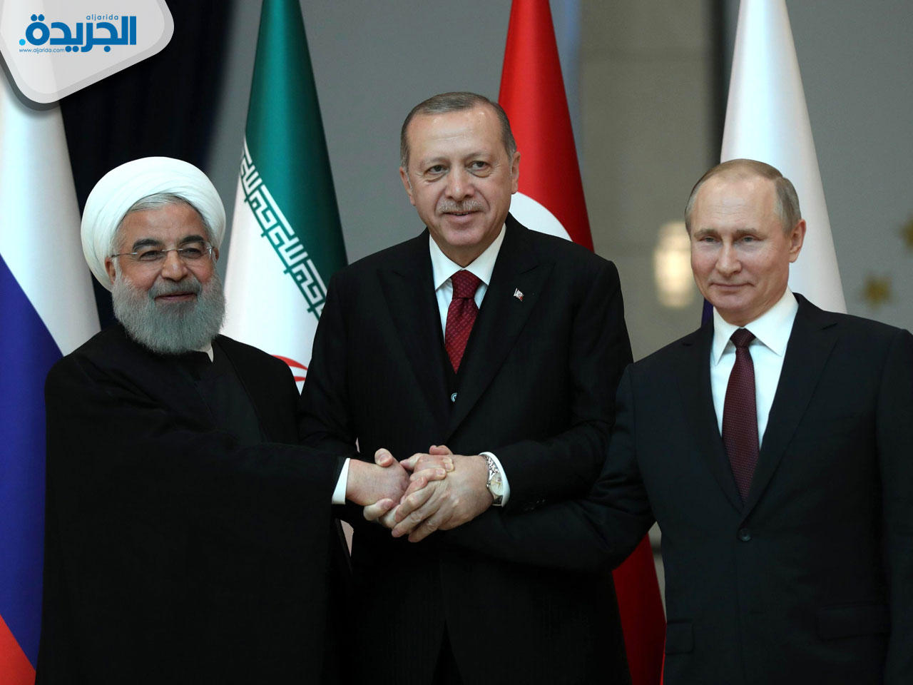 صورة جماعية للزعماء الثلاثة في قمة أنقرة