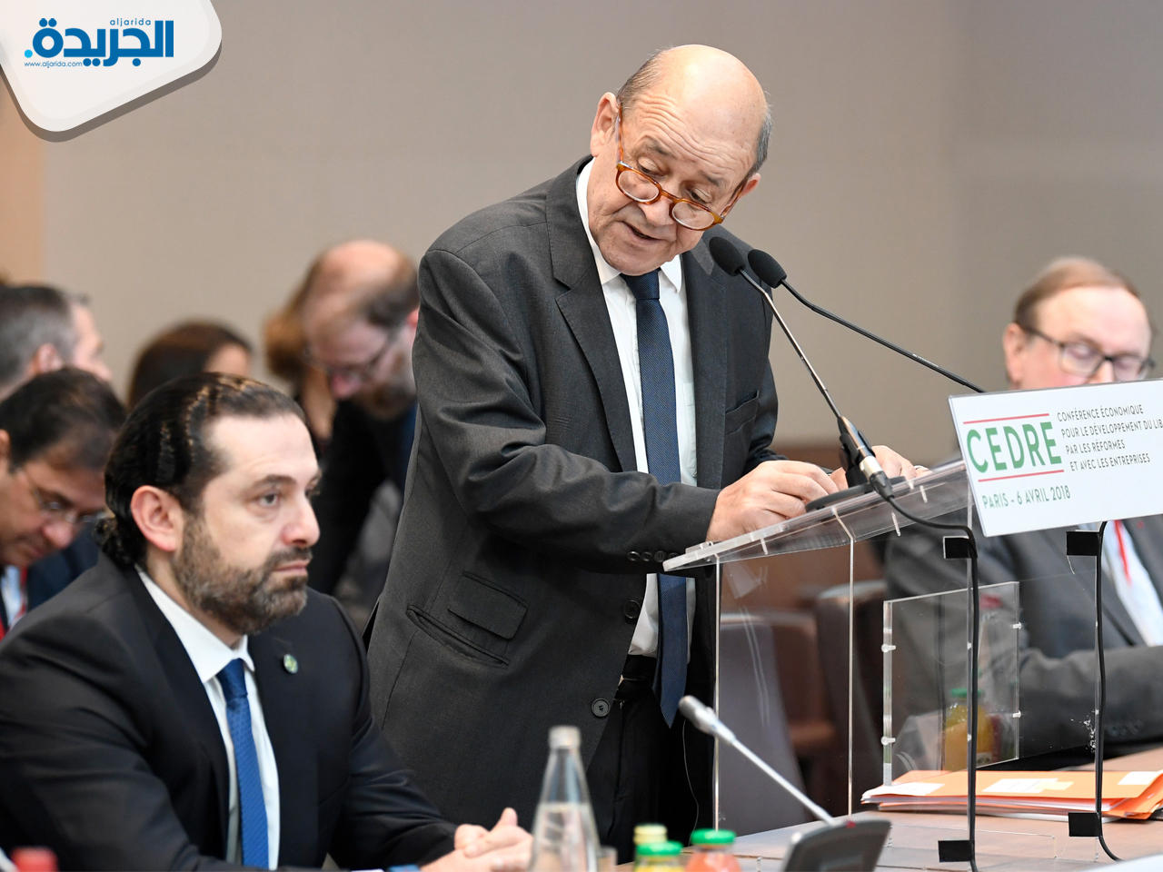 لودريان متحدثاً في مؤتمر دعم لبنان في باريس أمس (رويترز)