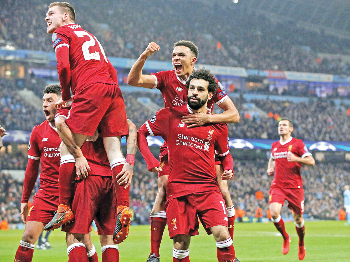 فرحة لاعبي ليفربول بعد إحراز صلاح الهدف الأول