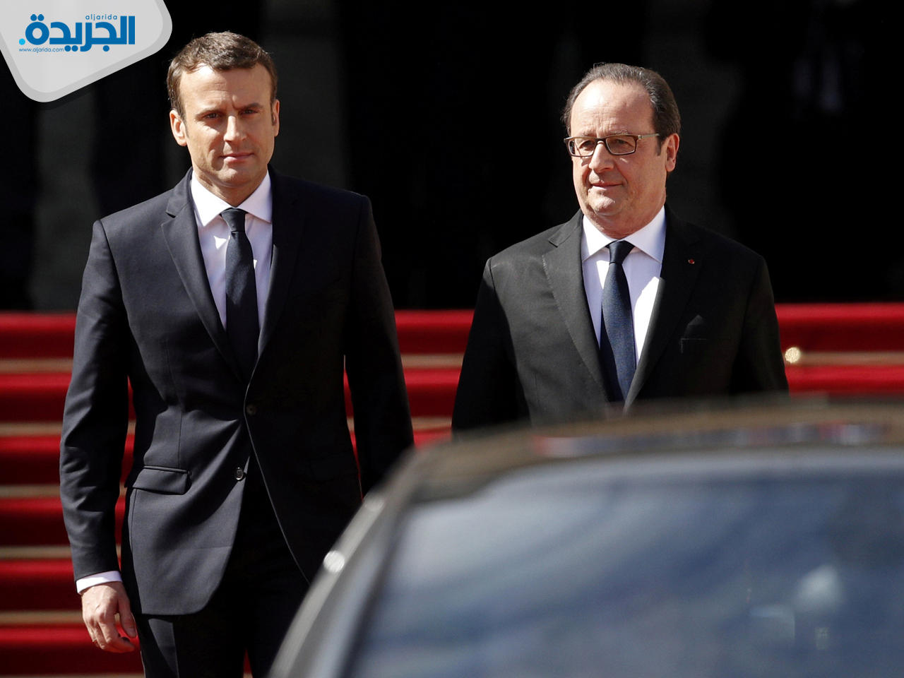 فرانسوا أولوند «يمين»وإيمانويل ماكرون «يسار»