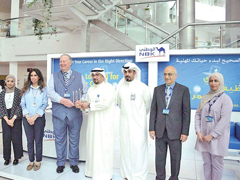 جانب من مشاركة «الوطني» في المعرض