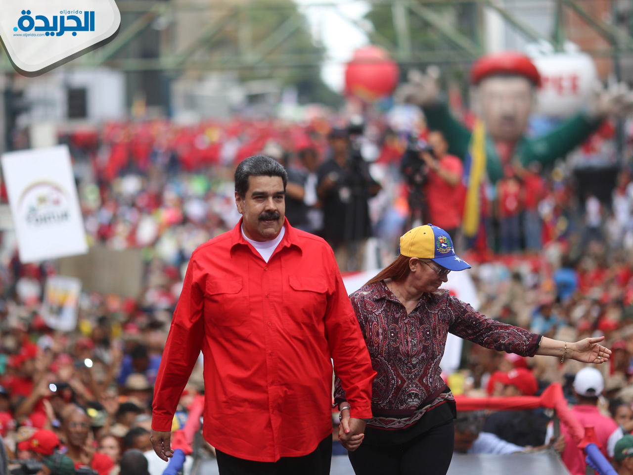 مادورو وزوجته يحضران تظاهرة لأنصاره في كاراكاس، فنزويلا