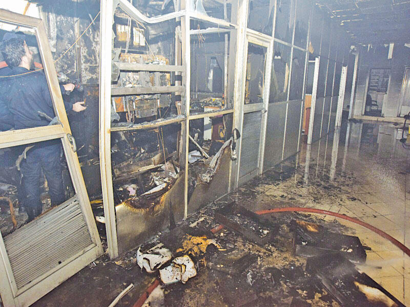 جانب من حريق جمعية الشعب