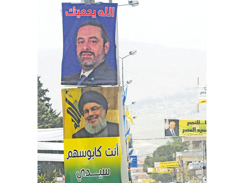 لافتات انتخابية في زحلة (رويترز)