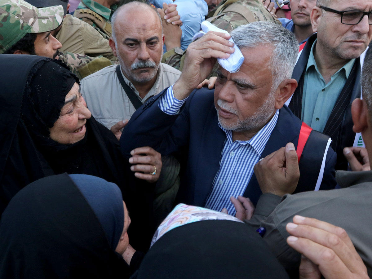 العامري خلال وجوده في كركوكلترويج حملته الانتخابية في 2 مايو الجاري  (رويترز)