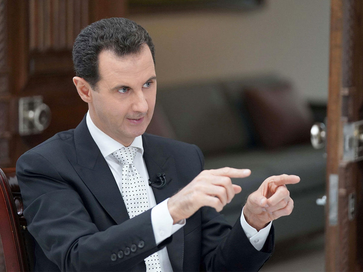 الأسد متحدّثاً خلال مقابلته مع الصحيفة اليونانية (رويترز)