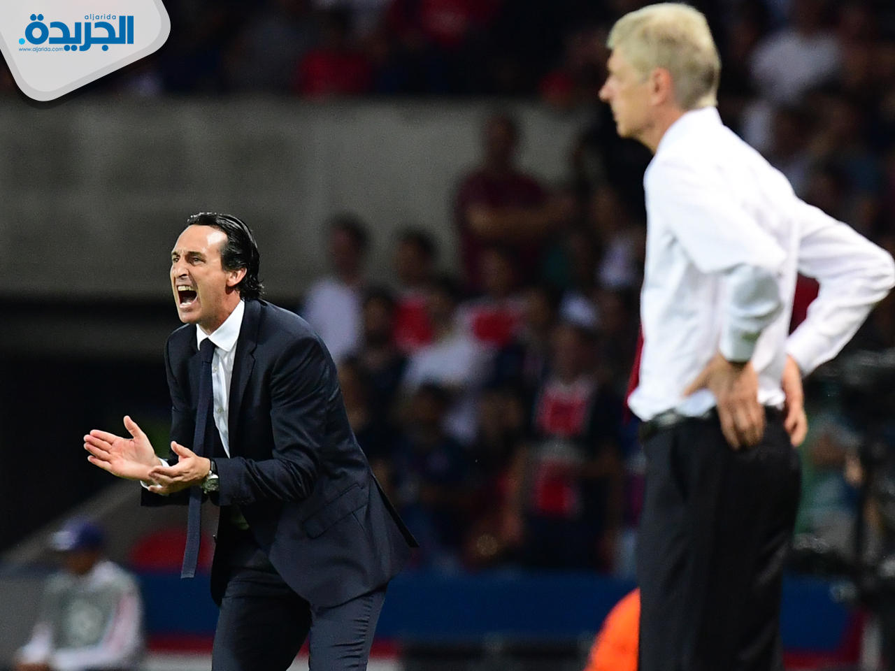 فينغر وايمري خلال مواجهة سابقة