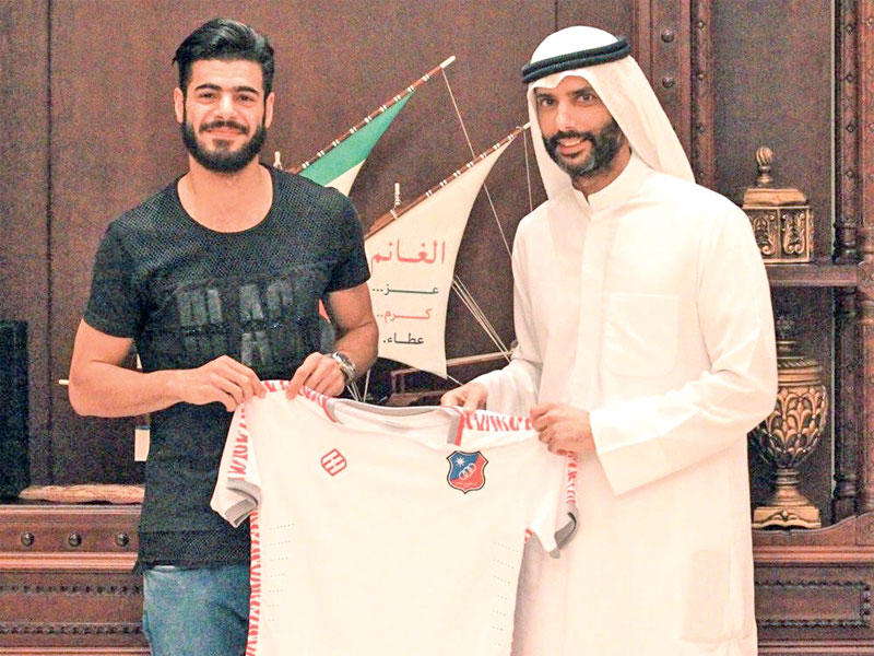 الحيام بقميص الكويت مع الغانمn