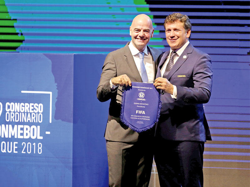 إنفانتينو رئيس الفيفا ودومينيغيز رئيس الكونميبول