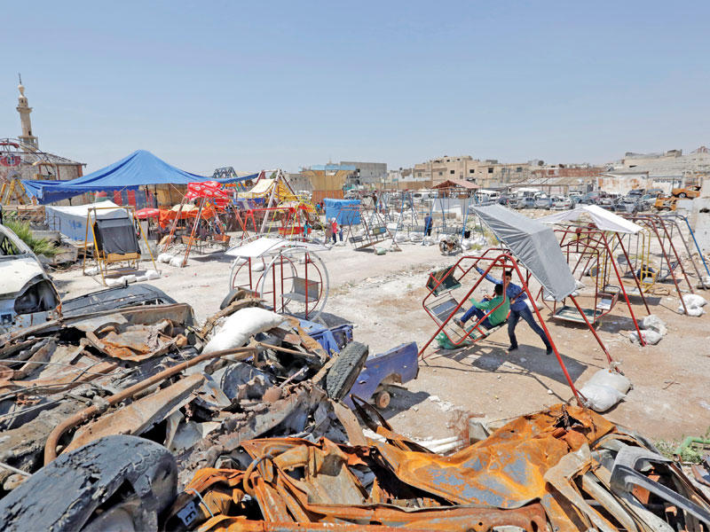 مشهد من مدينة دوما خلال عطلة عيد الفطر  (أي بي ايه)