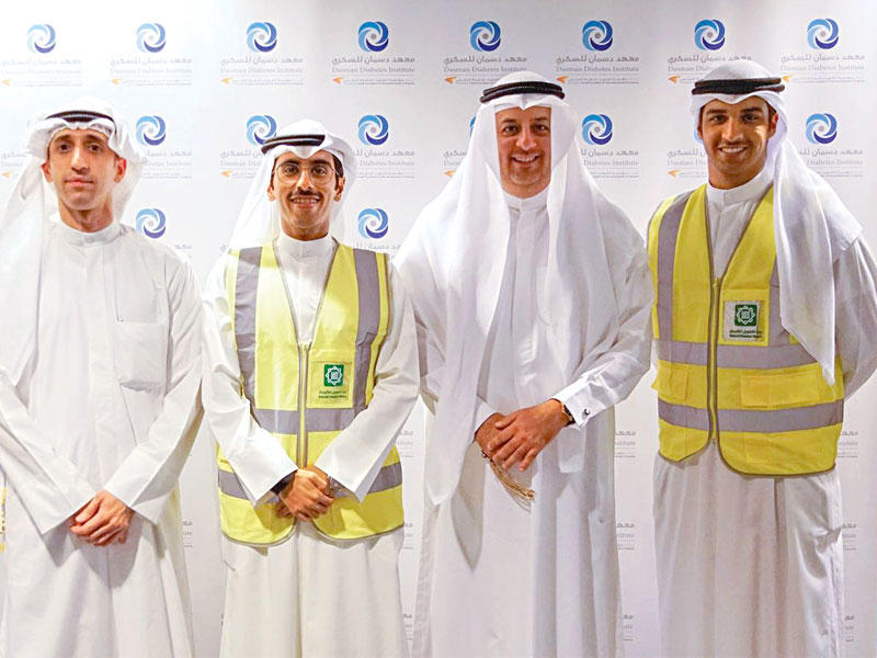 بعض أعضاء فريق «بيتك» التطوعيn