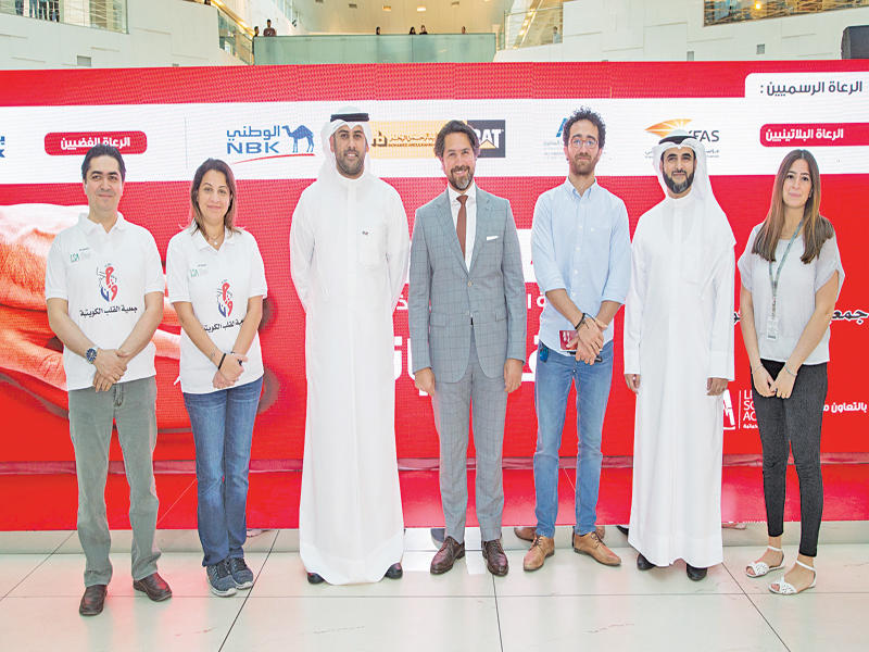 جانب من زيارة «الوطني» لـ«جمعية القلب»