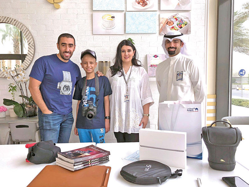 الطفل عبدالله مع فريق «الوطني»n