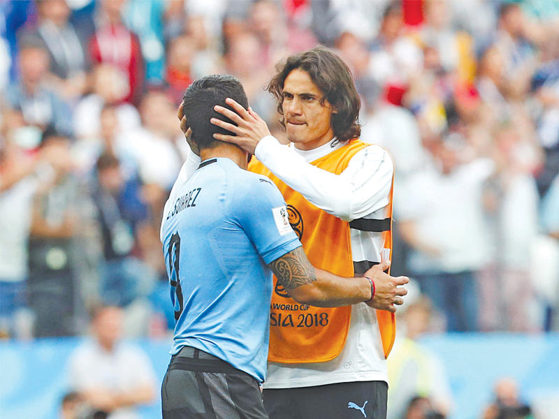 كافاني يواسي سواريز (رويترز)