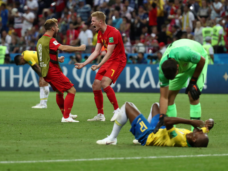 فرحة بلجيكية وخيبة أمل برازيلية بعد المباراة (رويترز)n