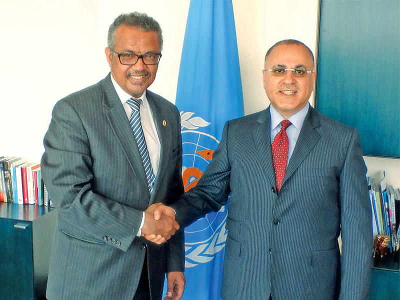السفير الغنيم خلال لقائه المدير العام لمنظمة الصحة العالمية