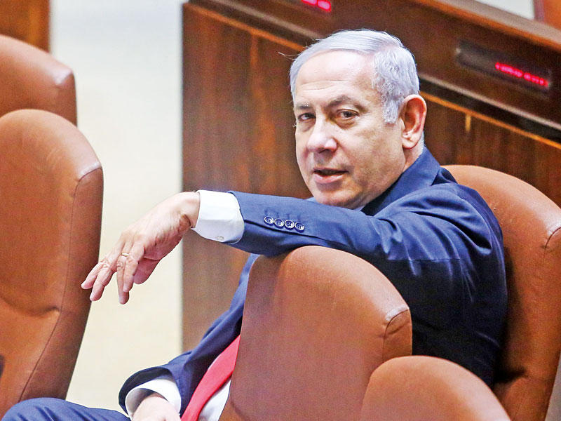 نتنياهو خلال مناقشة قانون «القومية اليهودية» في «الكنيست» أمس (أ ف ب)