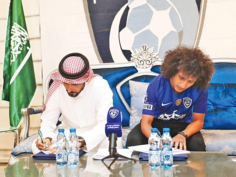 عموري والجابر خلال توقيع العقدn