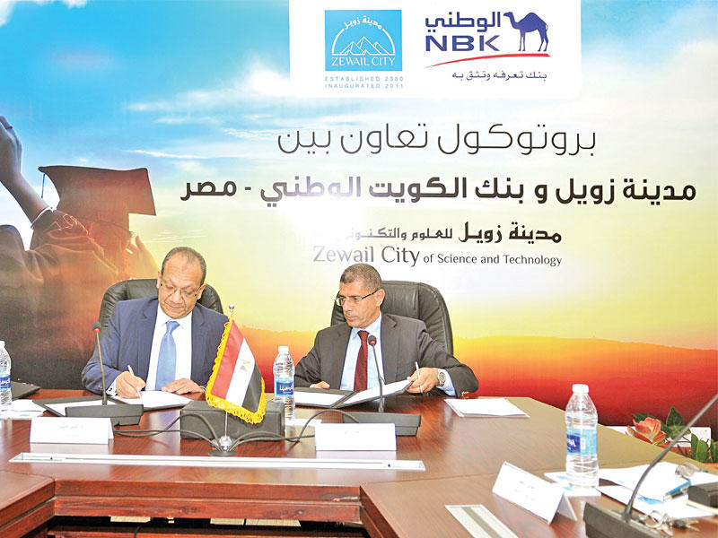 شريف صدقي وياسر حسن خلال توقيع بروتوكول التعاون