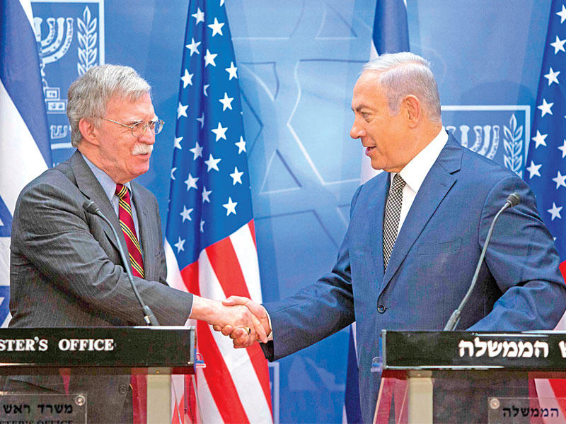 نتنياهو وبولتون خلال مؤتمرهما الصحافي بالقدس أمس (أ ف ب)