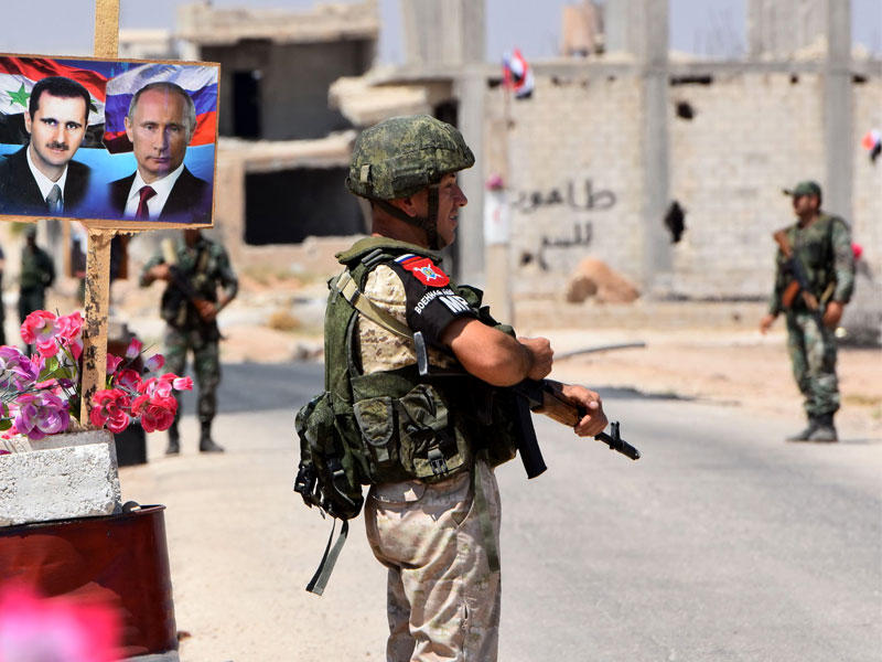 أفراد القوات الروسية والسورية