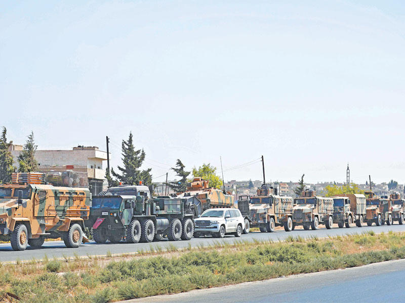 رتل عسكري تركي على طريق عام دمشق - حلب أمس (ا ف ب)n