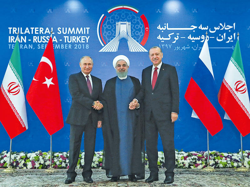 روحاني وإردوغان وبوتين خلال اجتماعهم في طهران أمسtt(إي بي إيه)