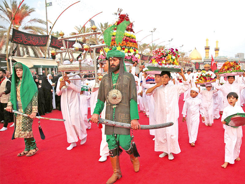 طقوس عاشورائية في كربلاء أمس الأول (أ ف ب)