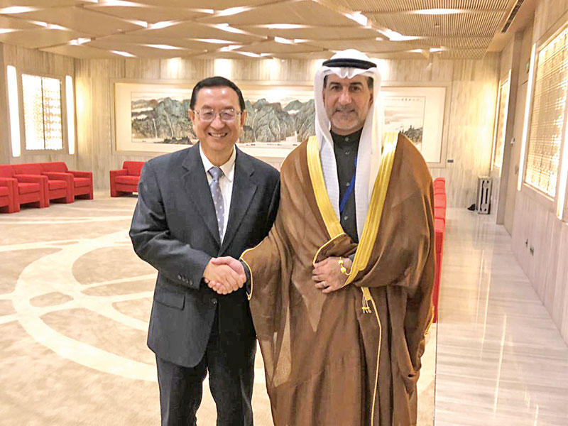 الأنصاري مع وزير الثقافة الصيني