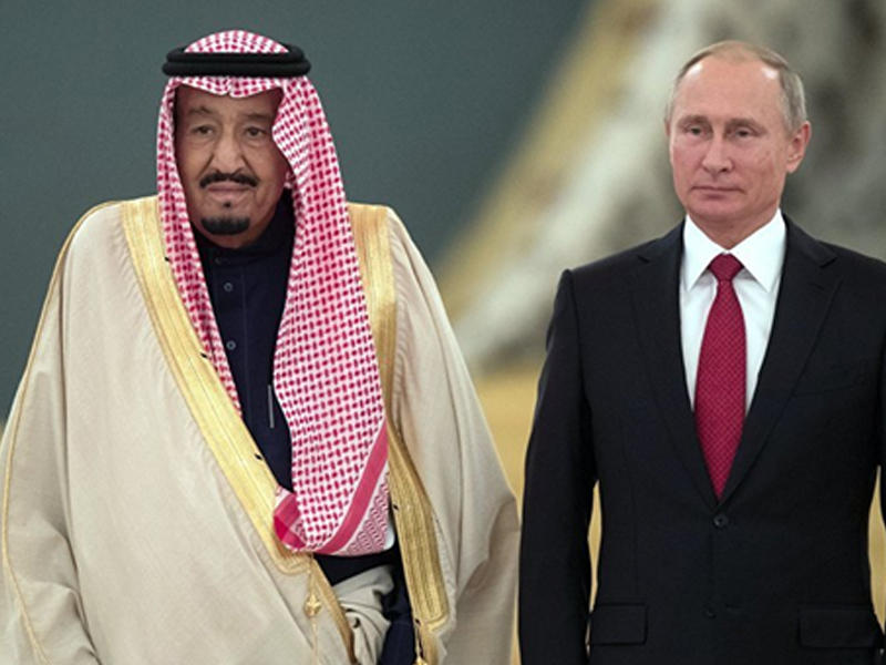 الرئيس الروسي مع العاهل السعودي