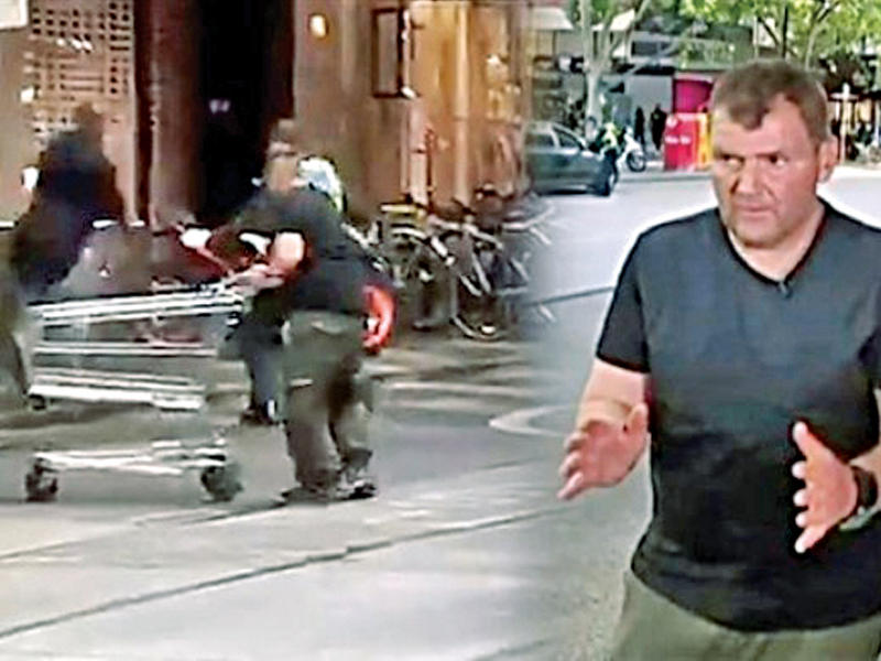صورة مأخوذة عن فيديو لـ«ترولي مان» ساعد الشرطة في التصدي لإرهابي