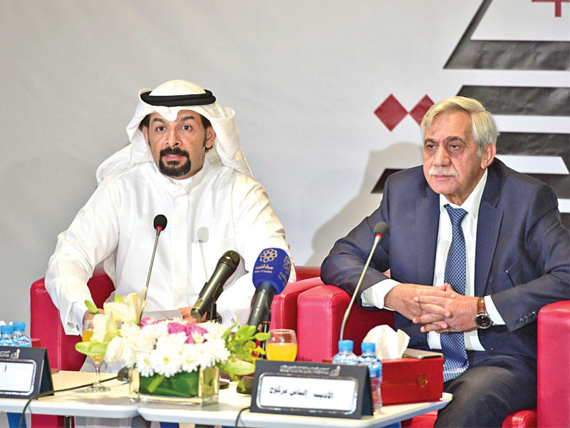 إلياس فركوح وفهد الهندال أثناء المحاضرة 