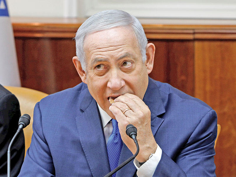 نتنياهو في الاجتماع الأسبوعي لحكومته أمس   (رويترز)