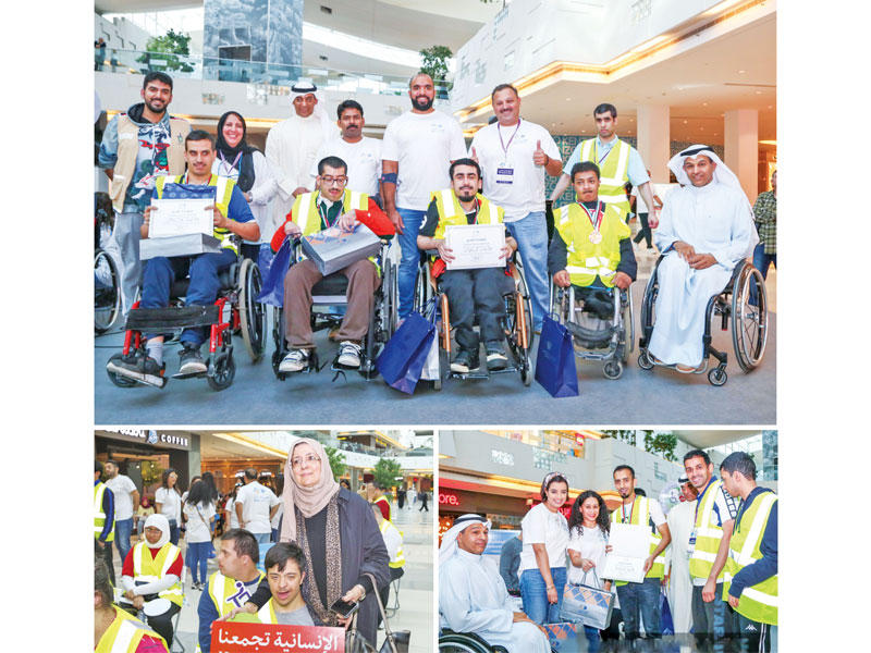 موظفو «أهلي كابيتال» مع أعضاء مؤسسة بوابة التدريب العالمية