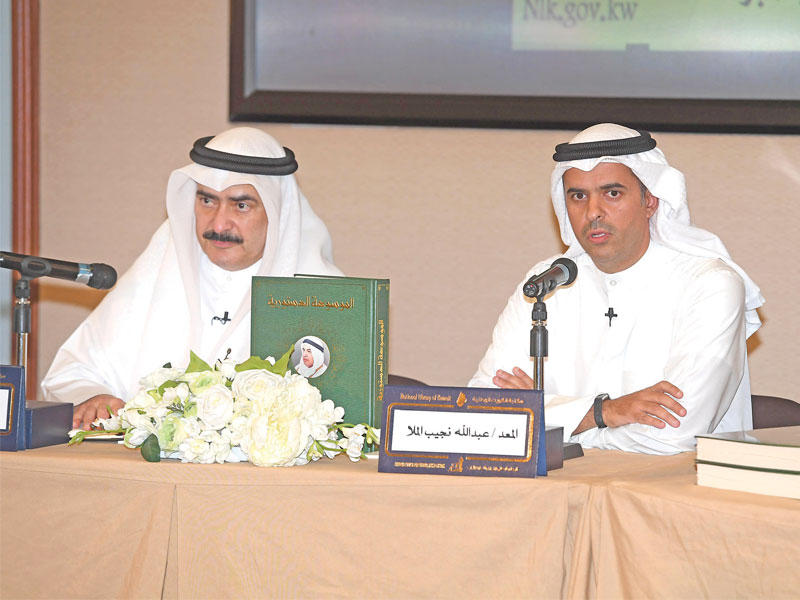 الملا والعبدالجليل أثناء الندوة 