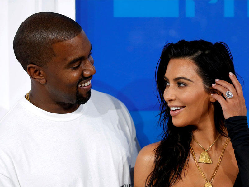 نجمة تلفزيون الواقع كيم كاردشيان، وزوجها المطرب كاني ويست