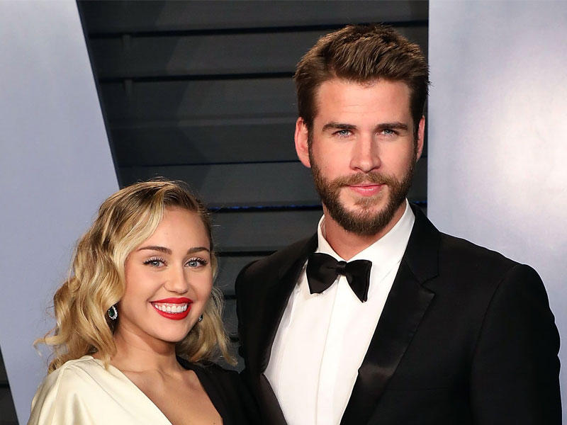 وليام هيمسورث ومايلي سايرس