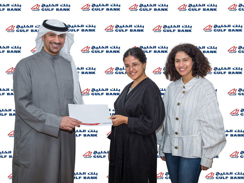 مؤسسو «سوق قوت» مع أحمد الأمير 