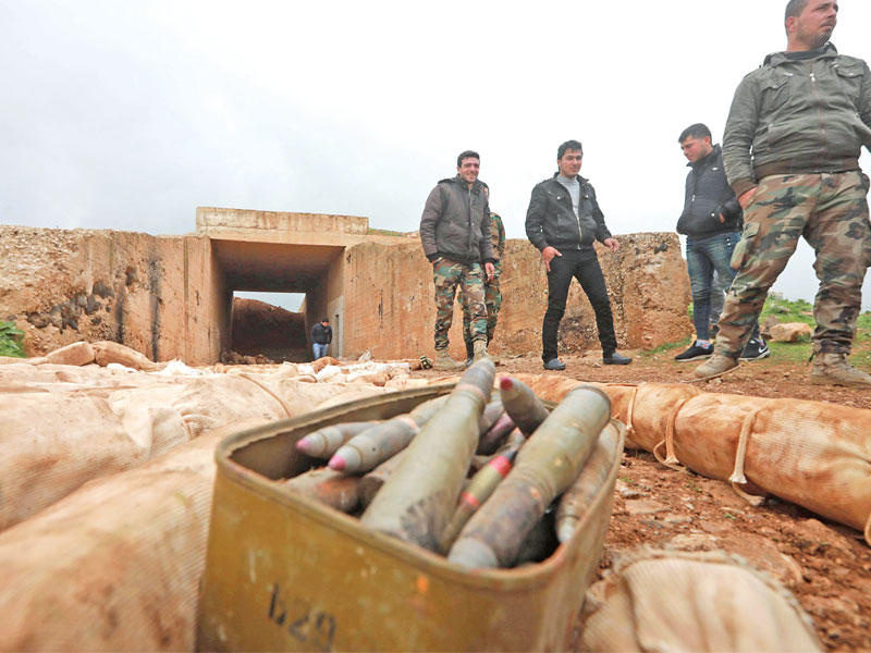 قذائف ومتفجرات عثرت عليها قوات النظام في درعا أمسt(أ ف ب)