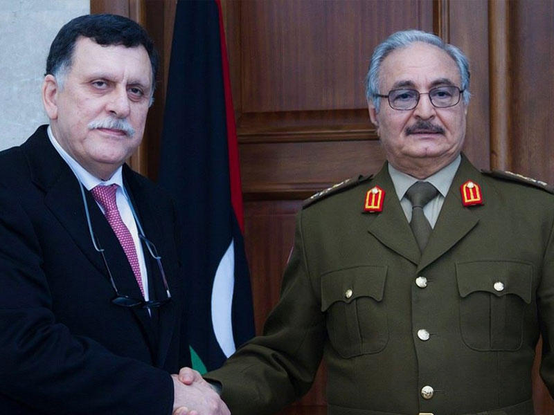 رئيس الوزراء المعترف به دوليا فايز السراج، وقائد قوات شرق البلاد، خليفة حفتر
