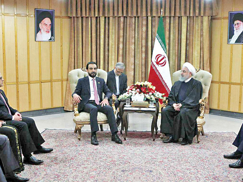 روحاني مستقبلاً الحلبوسي في طهران أمس الأول (إرنا)